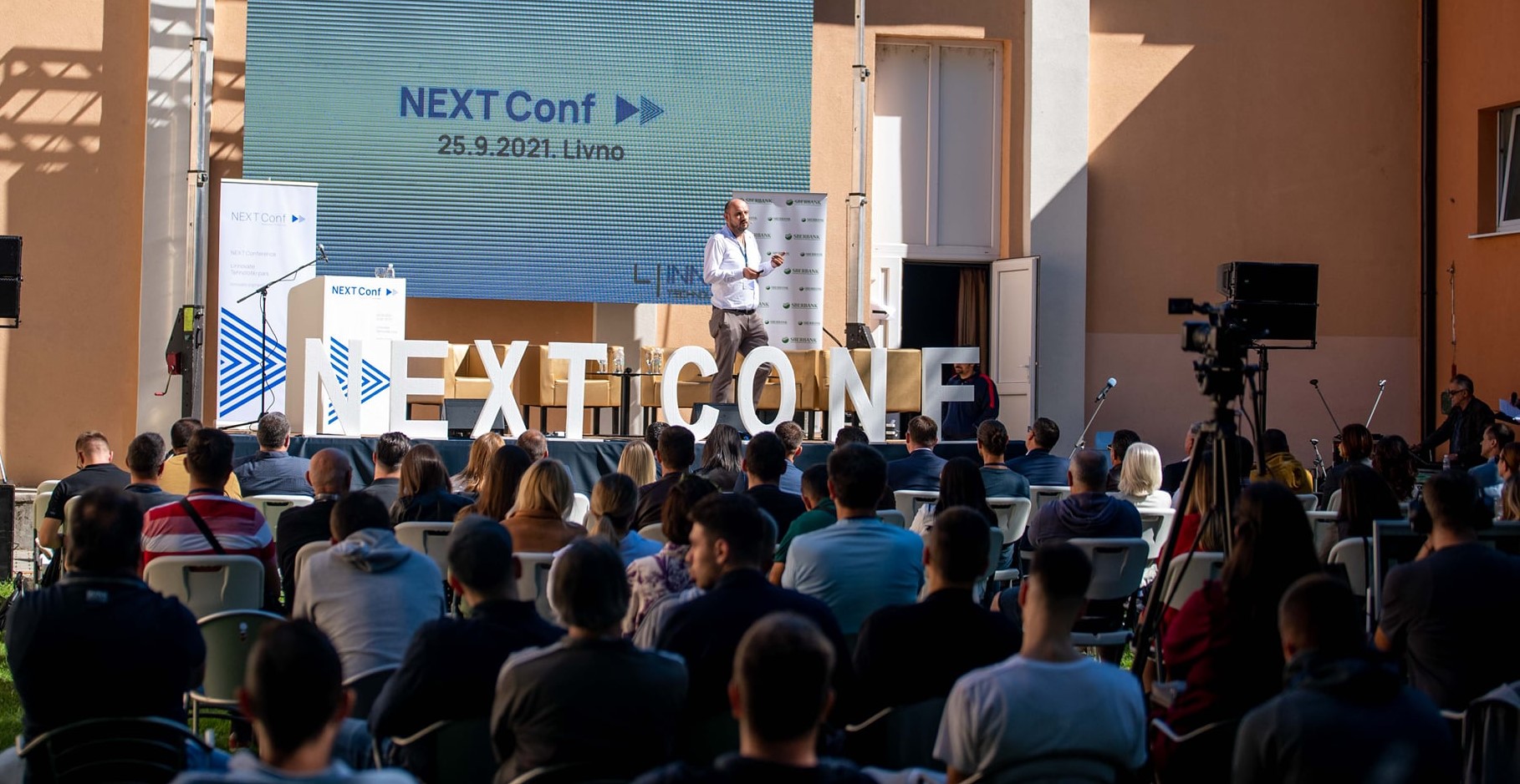 A photo from the NEXT Conference during xTend Solutions founder's speech